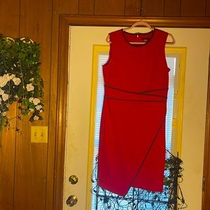 This dress is size 12; red with black rimming. It’s 38 inches long. In very good